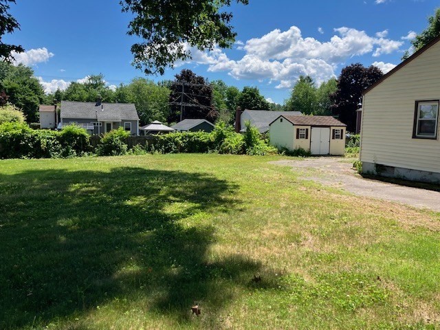 14 Birchwood Road Southwick, MA 01077 - Photo 4 of 25 a view of a back yard of the house