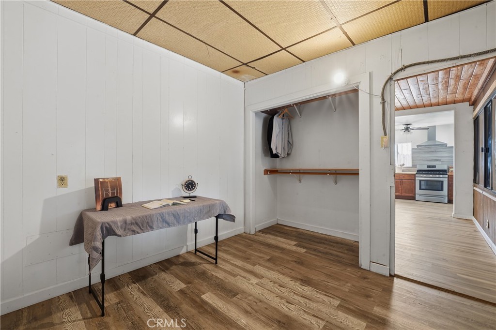 1724 East 10th Street Long Beach, CA 90813 - Photo 16 of 25 a bedroom with furniture and wooden floor