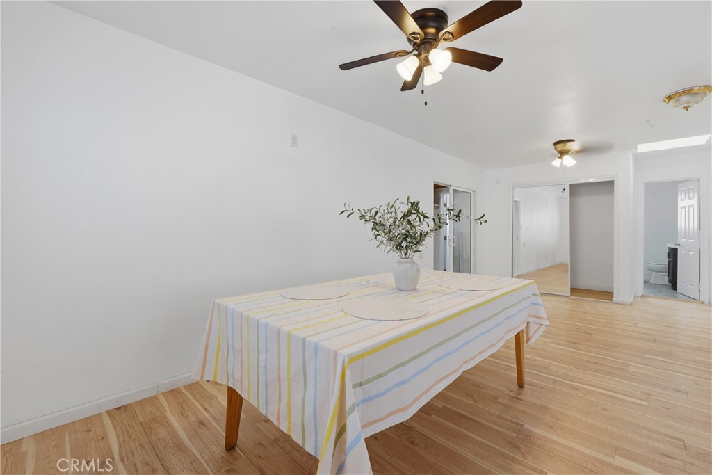 1724 East 10th Street Long Beach, CA 90813 - Photo 6 of 25 a dining room with a table and chairs