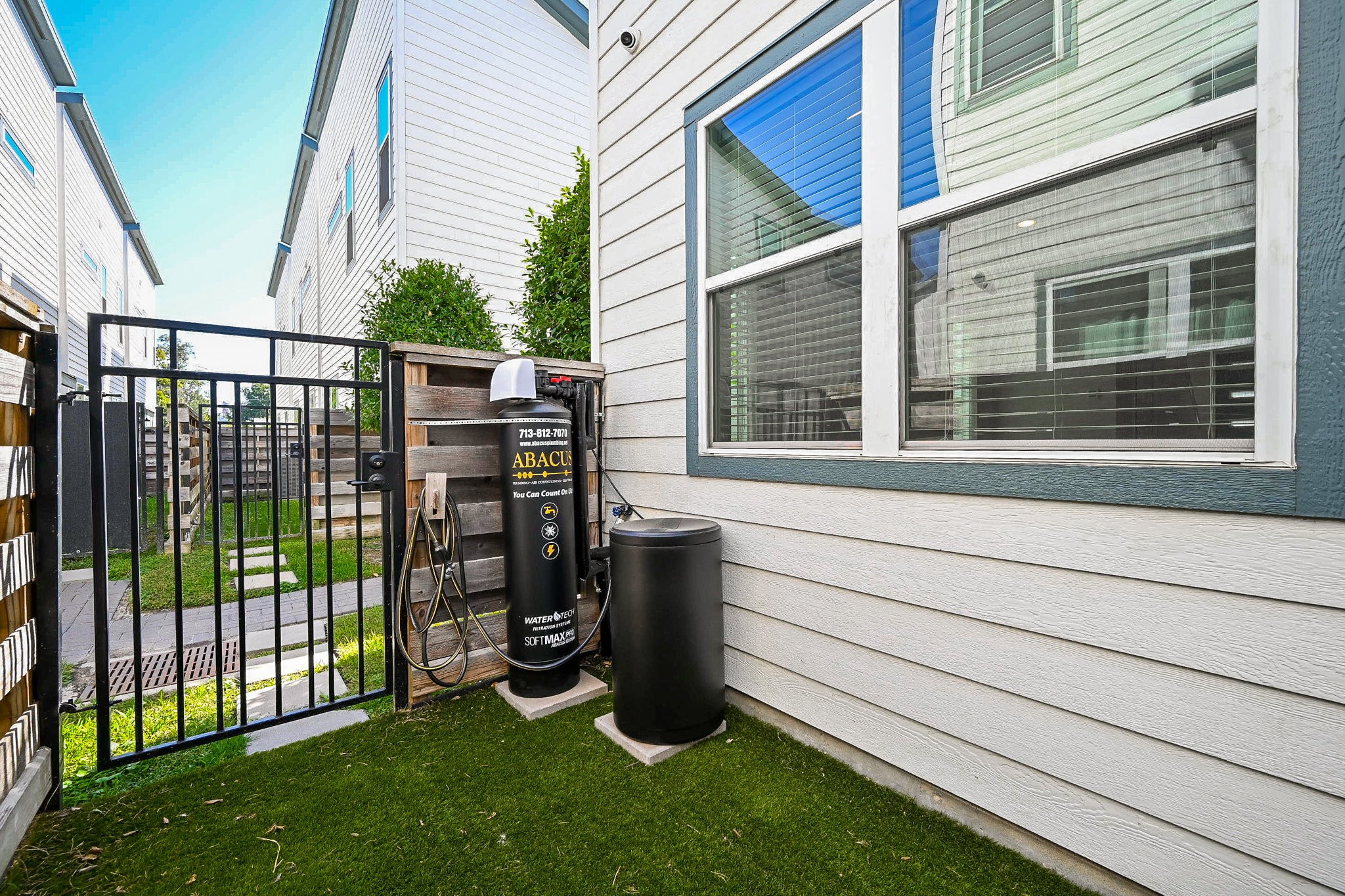 651 Press Street Houston, TX 77020 - Photo 20 of 20 a view of a porch with wooden floor and floor to ceiling window
