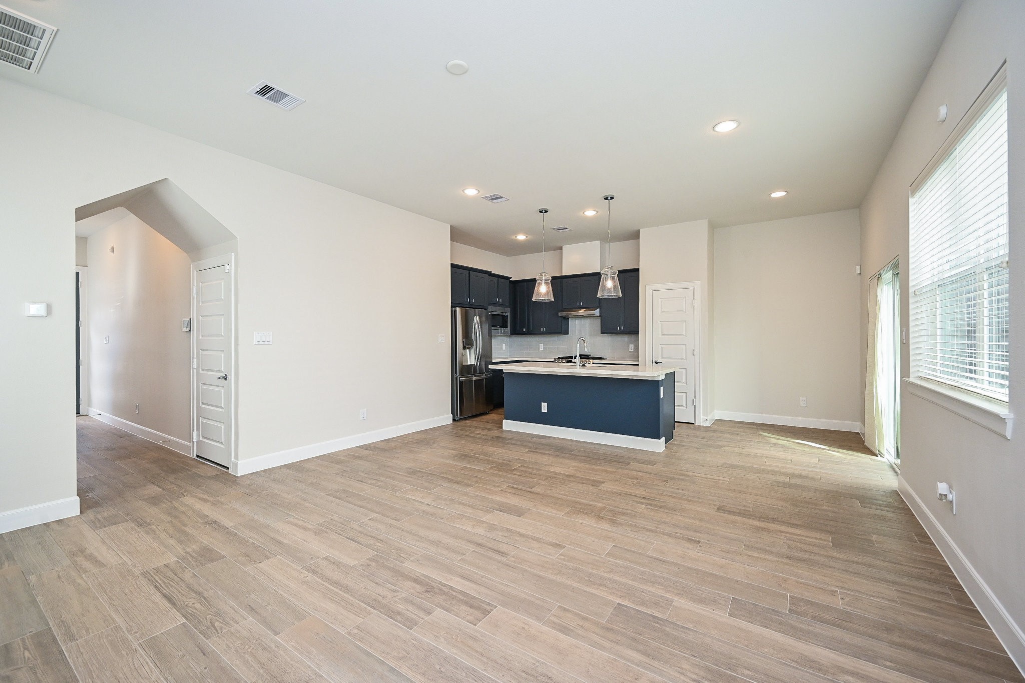 651 Press Street Houston, TX 77020 - Photo 5 of 20 a view of kitchen with kitchen island stainless steel appliances sink and cabinets