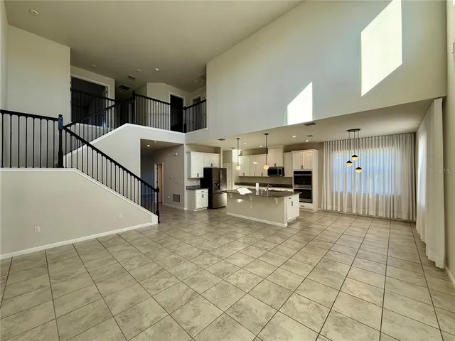 a view of an ocean and a big yard