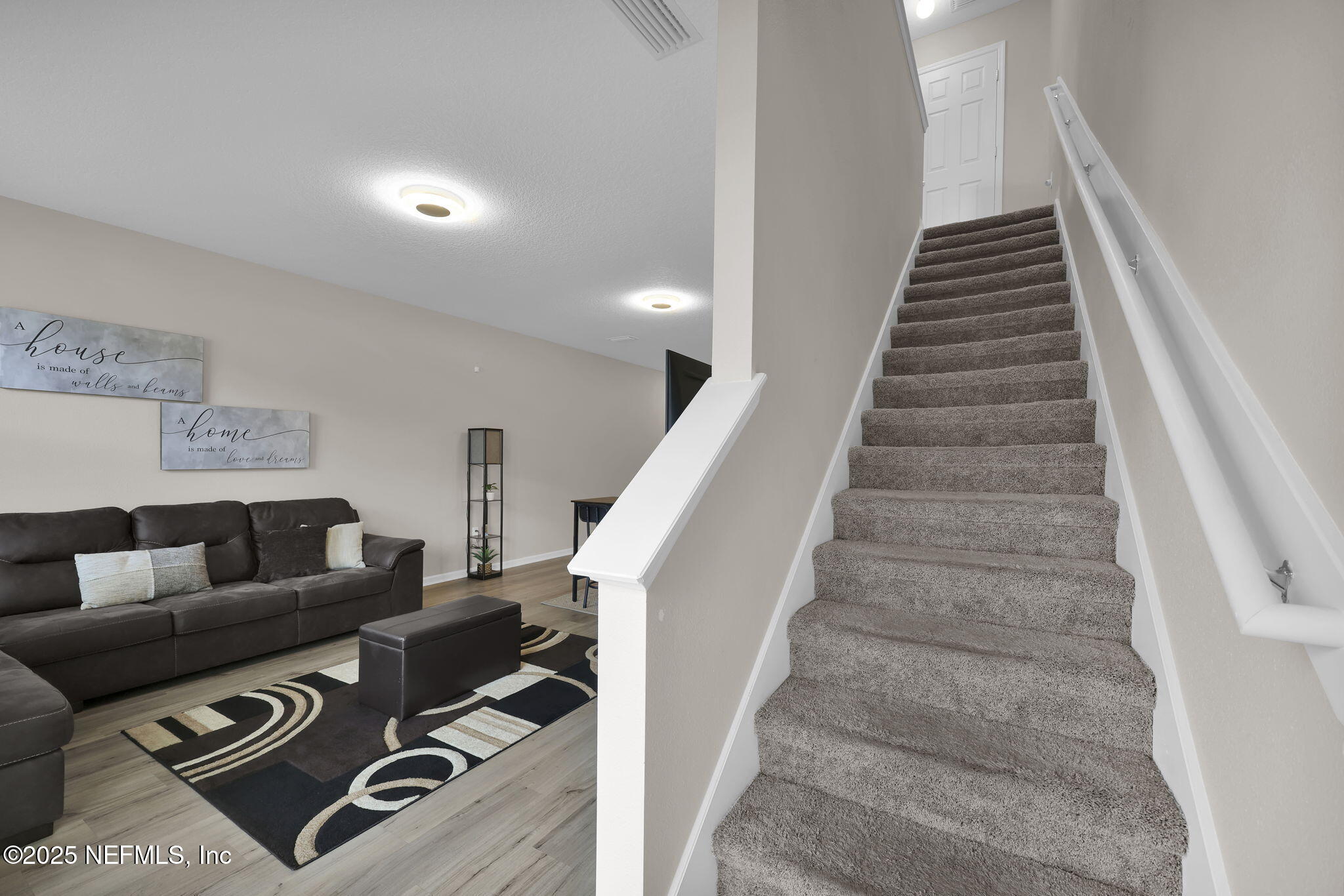7791 Merchants Way Jacksonville, FL 32222 - Photo 12 of 21 a living room with furniture and a rug