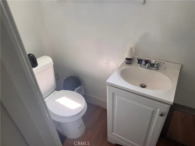 a bathroom with a toilet and a sink