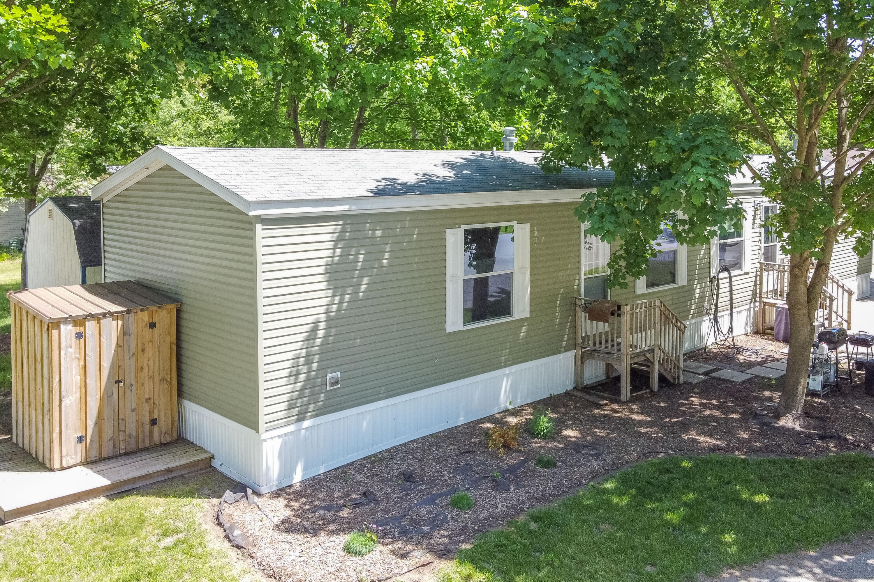 3538 Cedar Road Twin Lake, MI 49457 - Photo 1 of 37 Exterior - Side