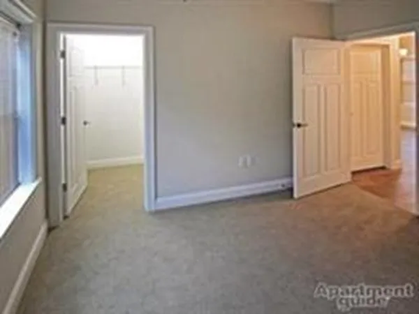 an empty room with windows