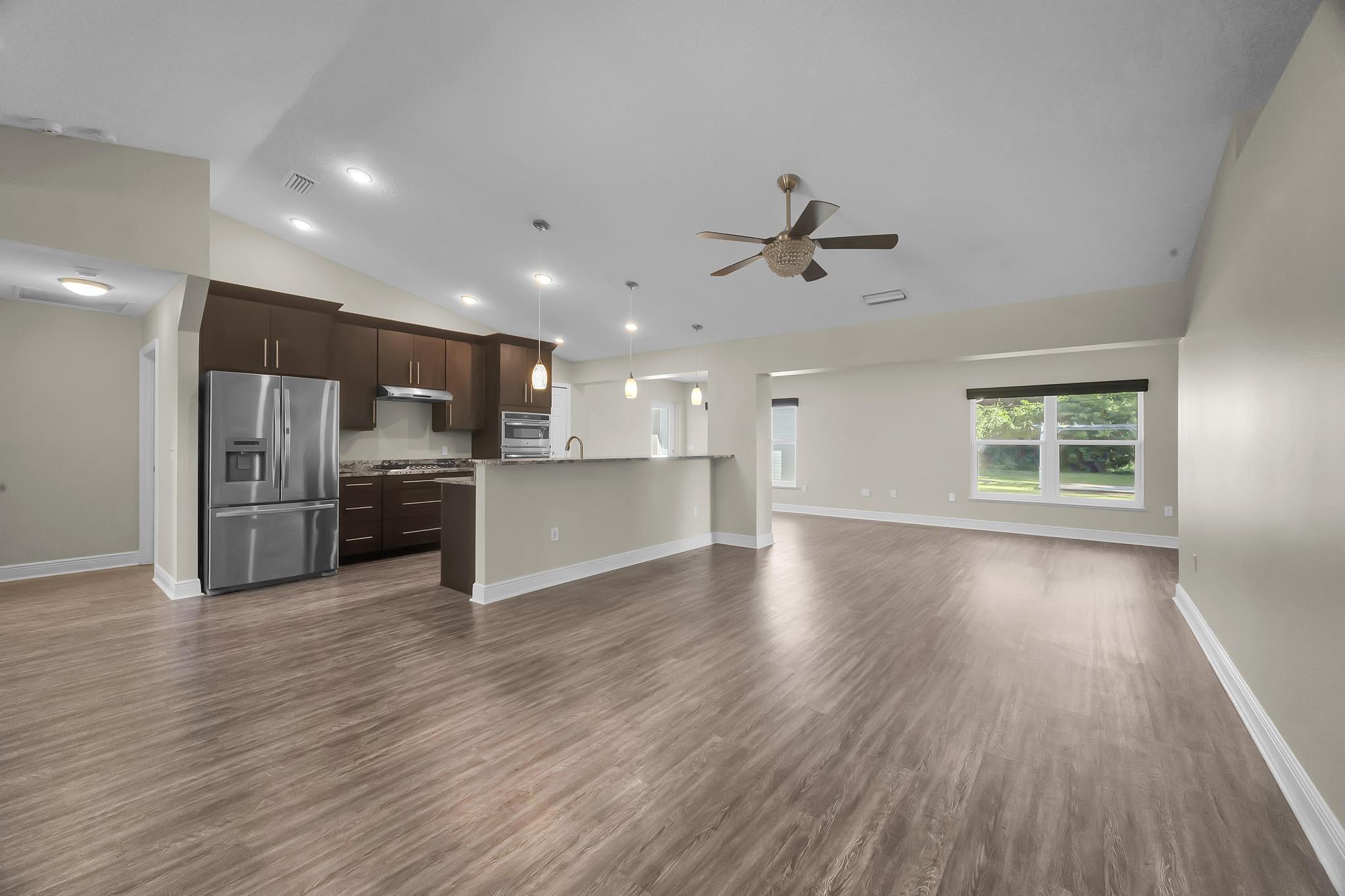 8330 Hidden Pines Road Fort Pierce, FL 34945 - Photo 18 of 34 Kitchen/ Living Room