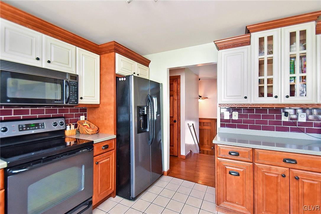 2421 Yost Road Bath, PA 18014 - Photo 7 of 31 a kitchen with stainless steel appliances a stove microwave and a refrigerator