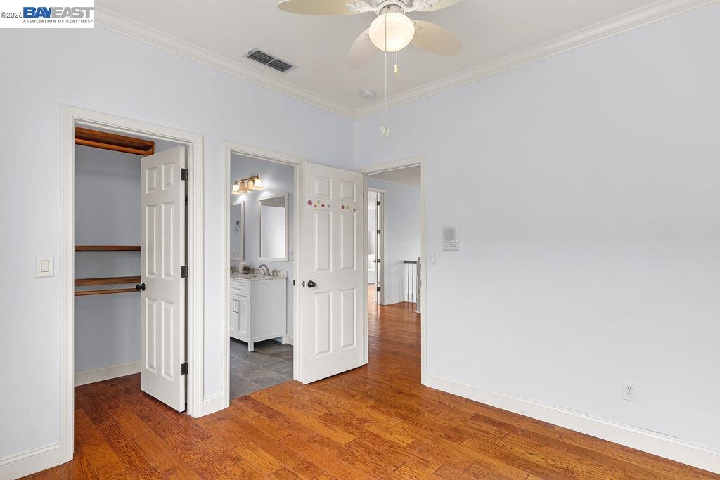 3400 Fallen Oak Drive Modesto, CA 95355 - Photo 15 of 59 a view of a room with wooden floor and white walls