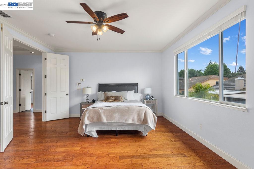 3400 Fallen Oak Drive Modesto, CA 95355 - Photo 24 of 59 a bedroom with a bed and a large window