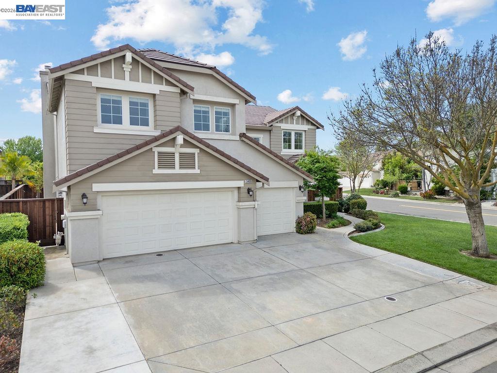 3400 Fallen Oak Drive Modesto, CA 95355 - Photo 51 of 59 a view of a house with a yard and large tree