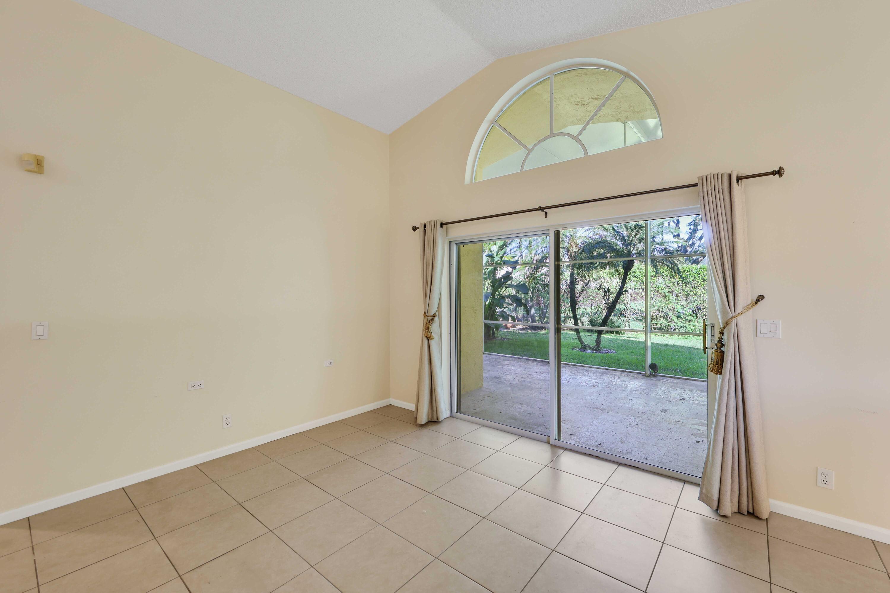 5125 Columbo Court Delray Beach, FL 33484 - Photo 14 of 60 a view of an entryway with wooden floor