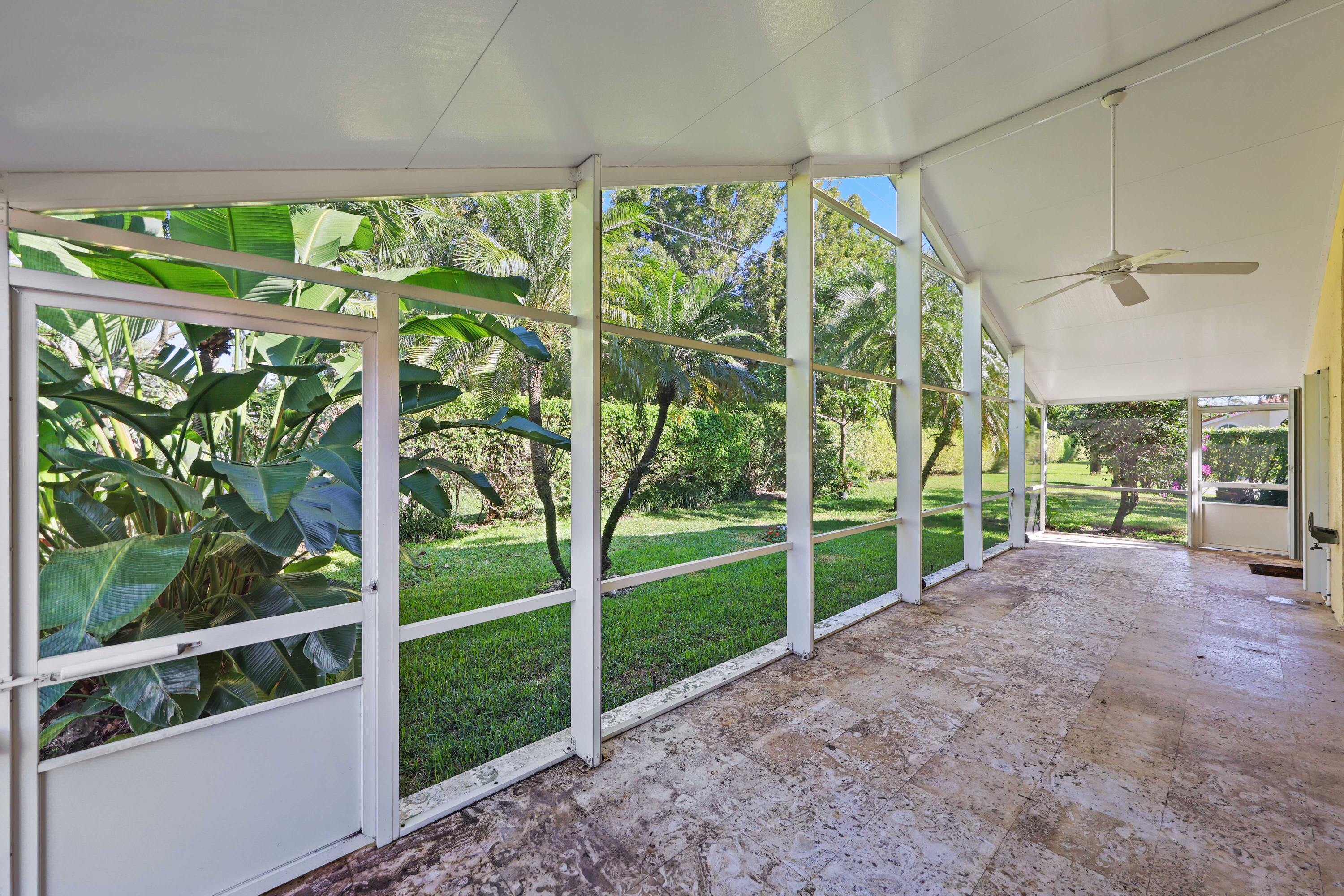 5125 Columbo Court Delray Beach, FL 33484 - Photo 40 of 60 a view of a garden with an outdoor space