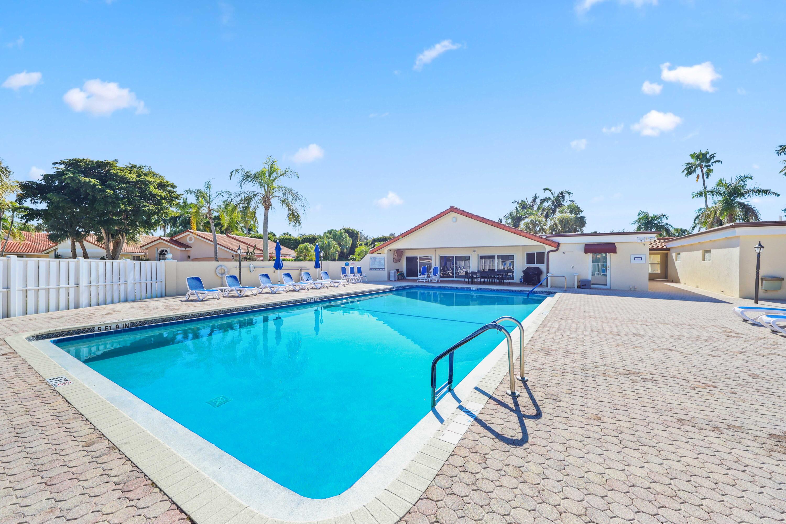 5125 Columbo Court Delray Beach, FL 33484 - Photo 54 of 60 a view of swimming pool with seating area