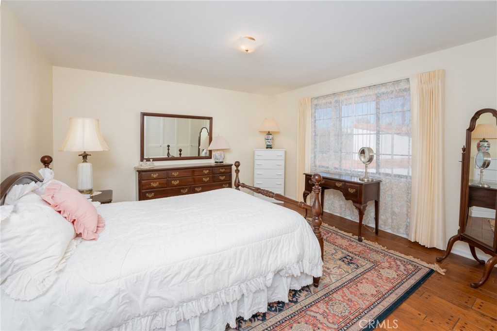 219 Esplanade San Clemente, CA 92672 - Photo 21 of 63 a bedroom with a bed and a flat screen tv