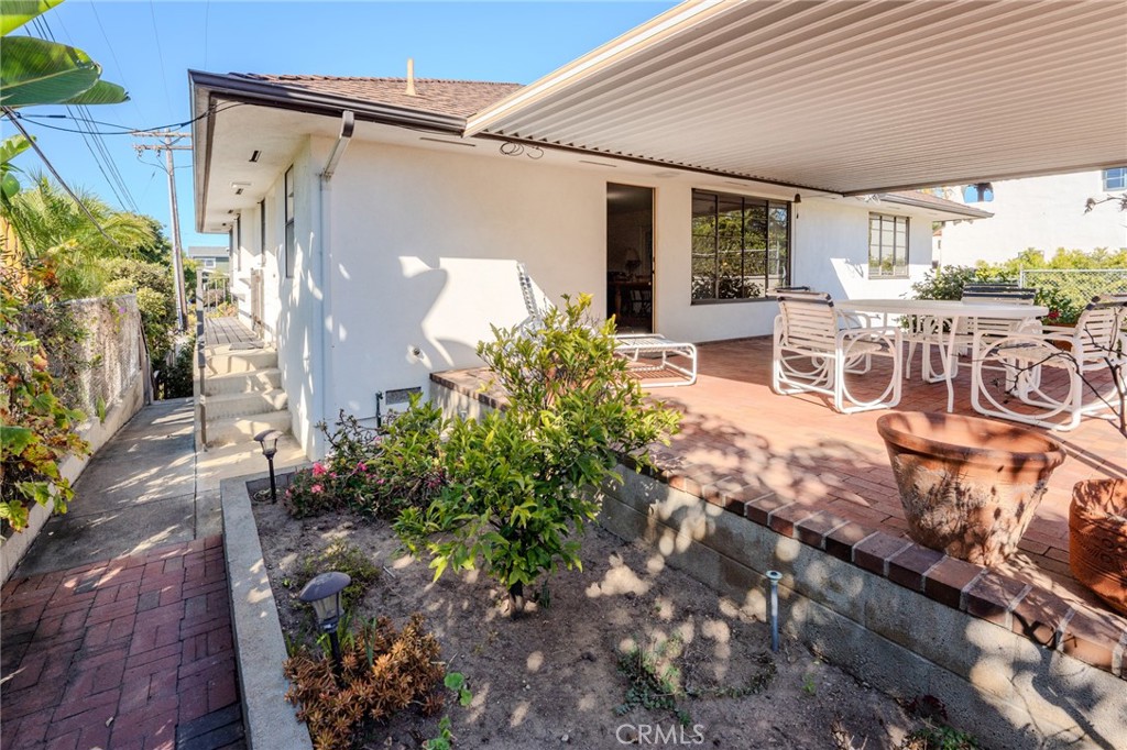 219 Esplanade San Clemente, CA 92672 - Photo 27 of 63 a backyard of a house with yard and outdoor seating