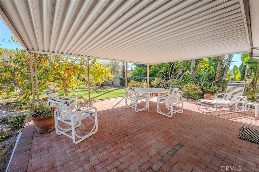 219 Esplanade San Clemente, CA 92672 - Photo 32 of 63 a view of a patio with table and chairs and potted plants