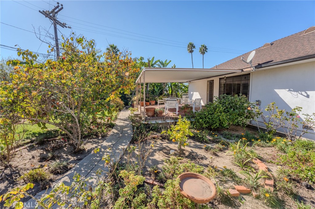 219 Esplanade San Clemente, CA 92672 - Photo 36 of 63 a view of a house with a yard and potted plants