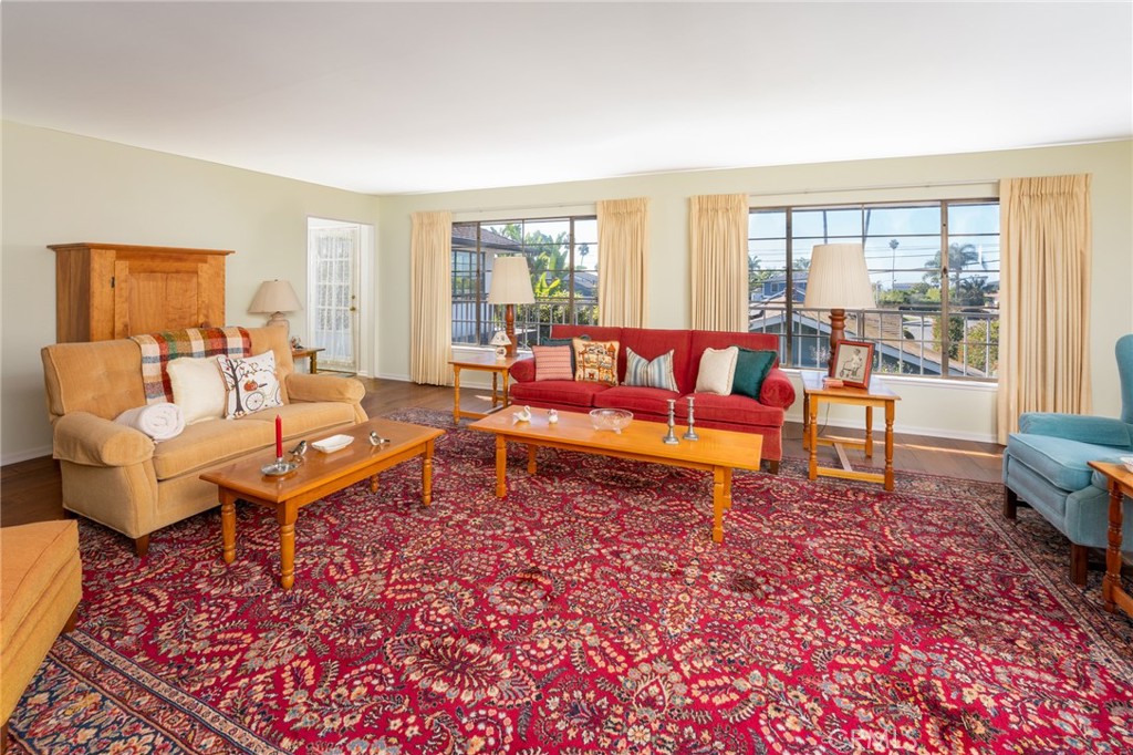 219 Esplanade San Clemente, CA 92672 - Photo 9 of 63 a living room with furniture and a rug