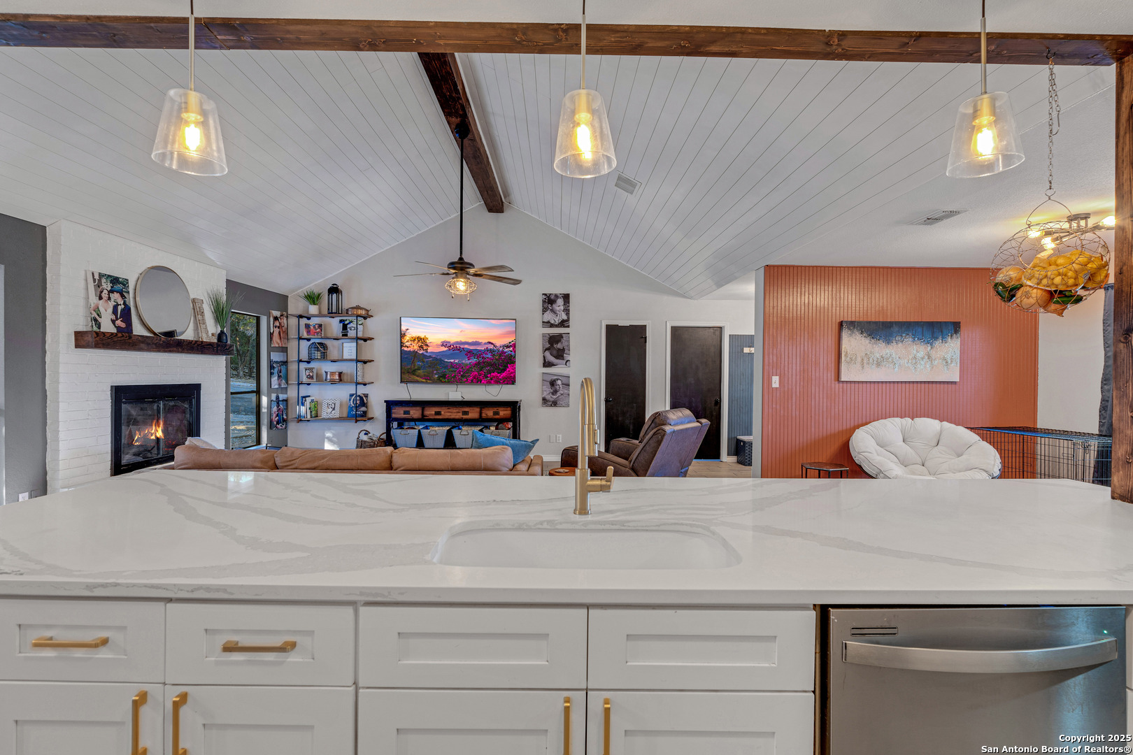 2665 Casey Road Bulverde, TX 78163 - Photo 17 of 42 a living room with fireplace furniture and a flat screen tv