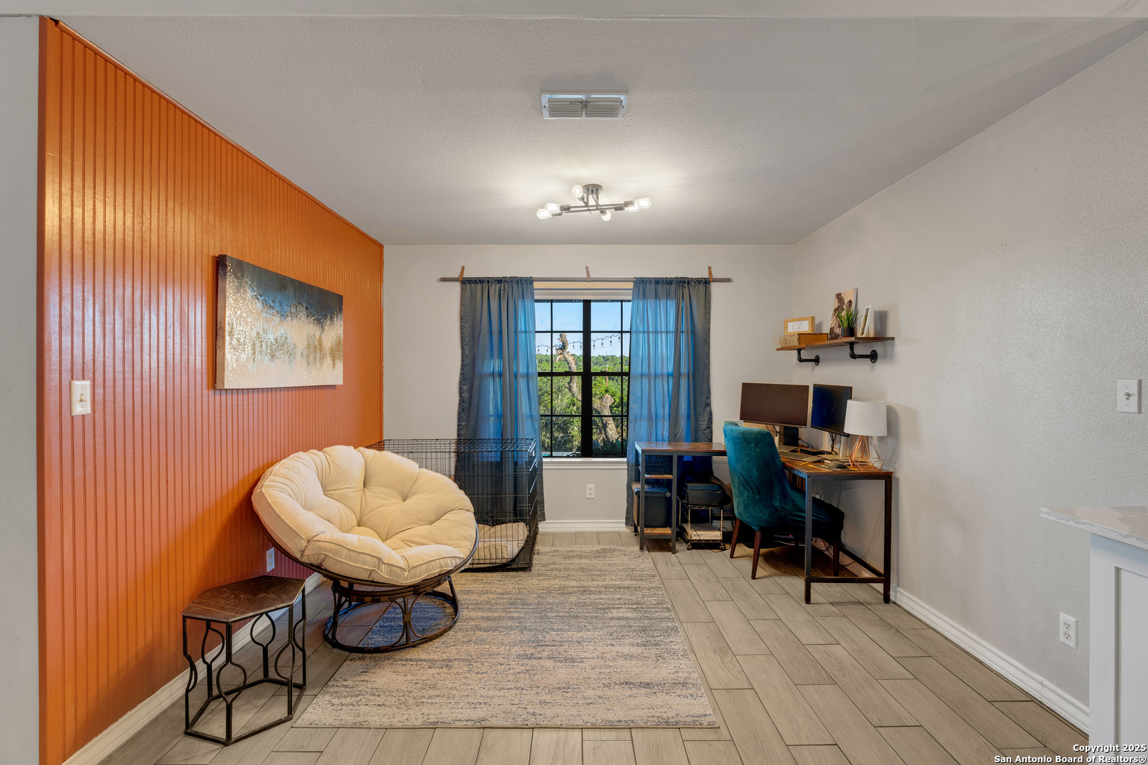 2665 Casey Road Bulverde, TX 78163 - Photo 27 of 42 a view of a workspace with furniture and a window