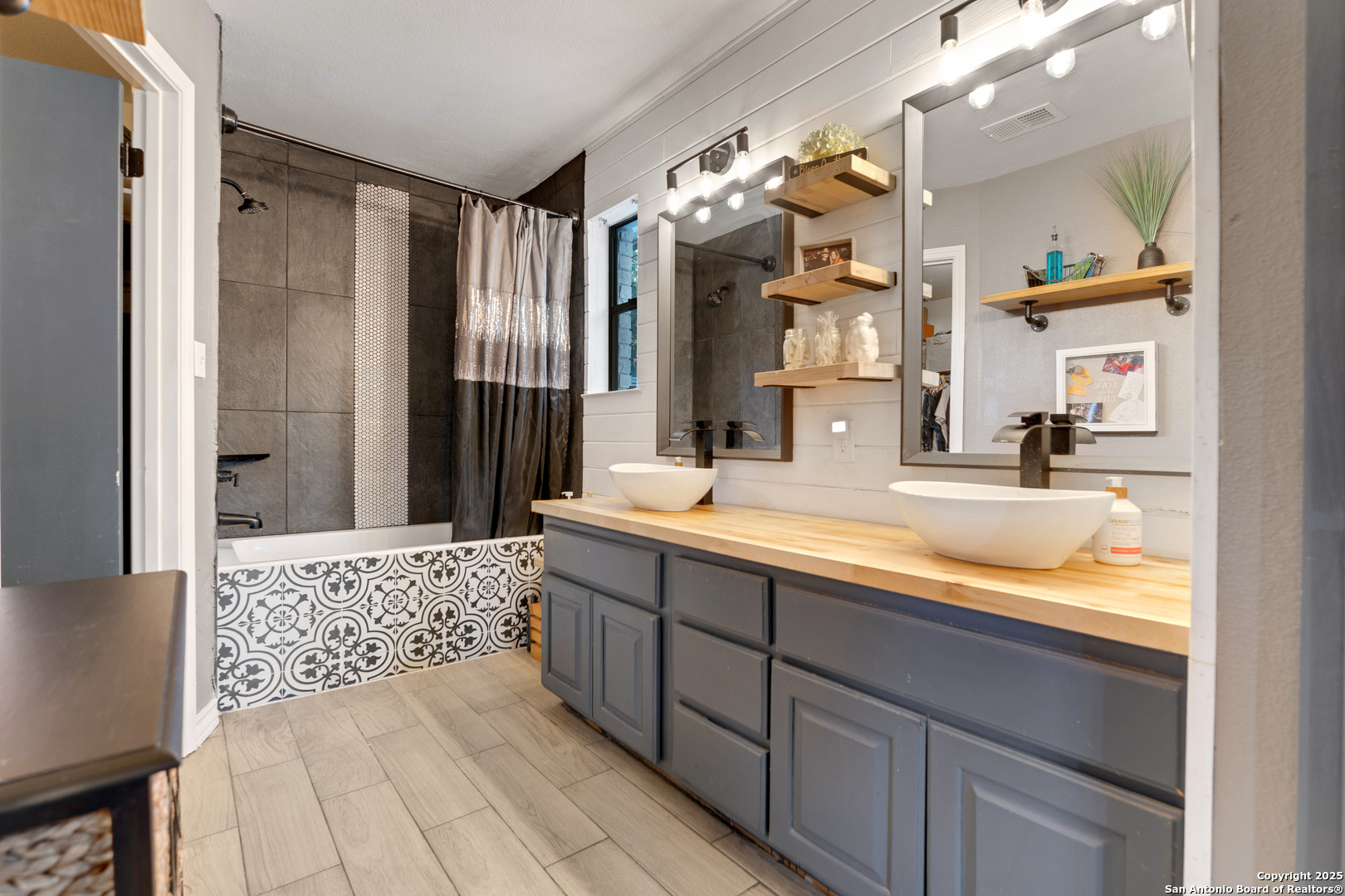 2665 Casey Road Bulverde, TX 78163 - Photo 31 of 42 a bathroom with a sink double vanity and a mirror