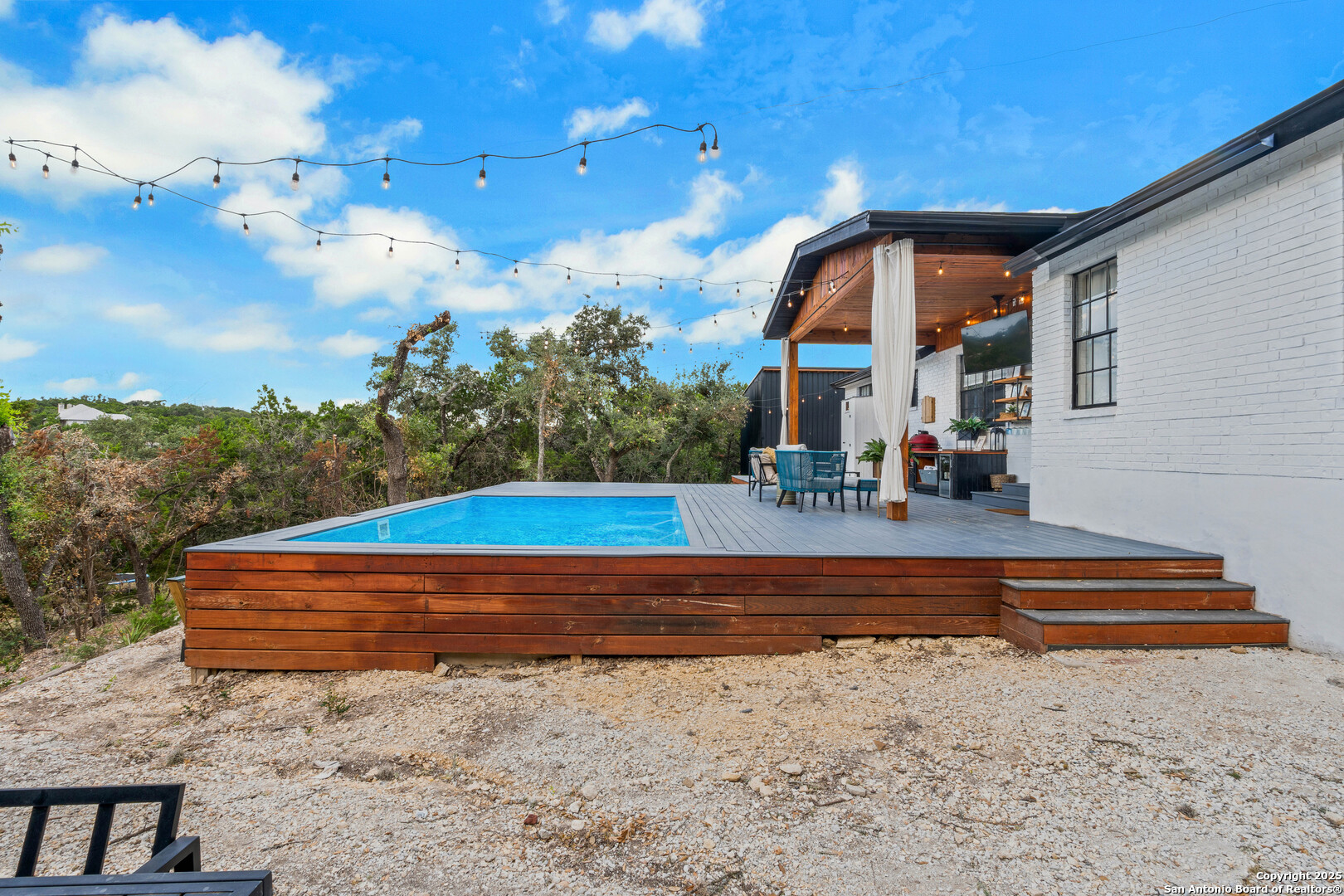2665 Casey Road Bulverde, TX 78163 - Photo 37 of 42 a backyard of a house with large trees
