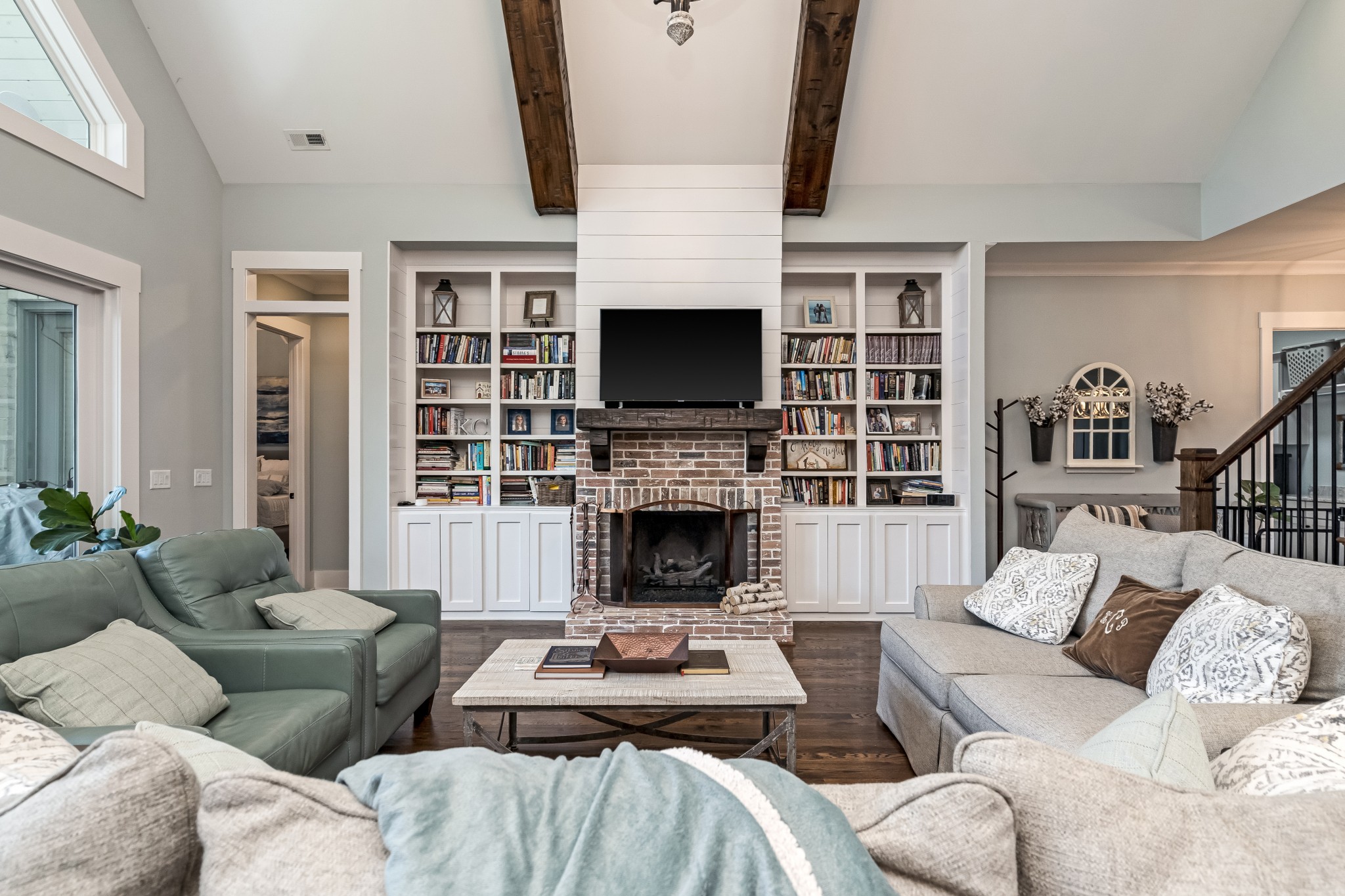 325 Circuit Road Franklin, TN 37064 - Photo 15 of 55 a living room with furniture a fireplace and a flat screen tv