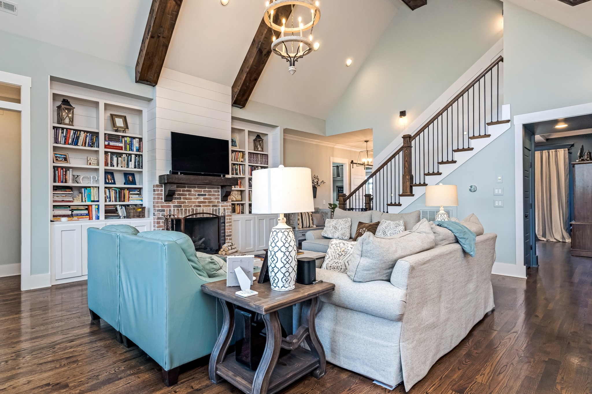 325 Circuit Road Franklin, TN 37064 - Photo 16 of 55 a living room with furniture a flat screen tv and a fireplace