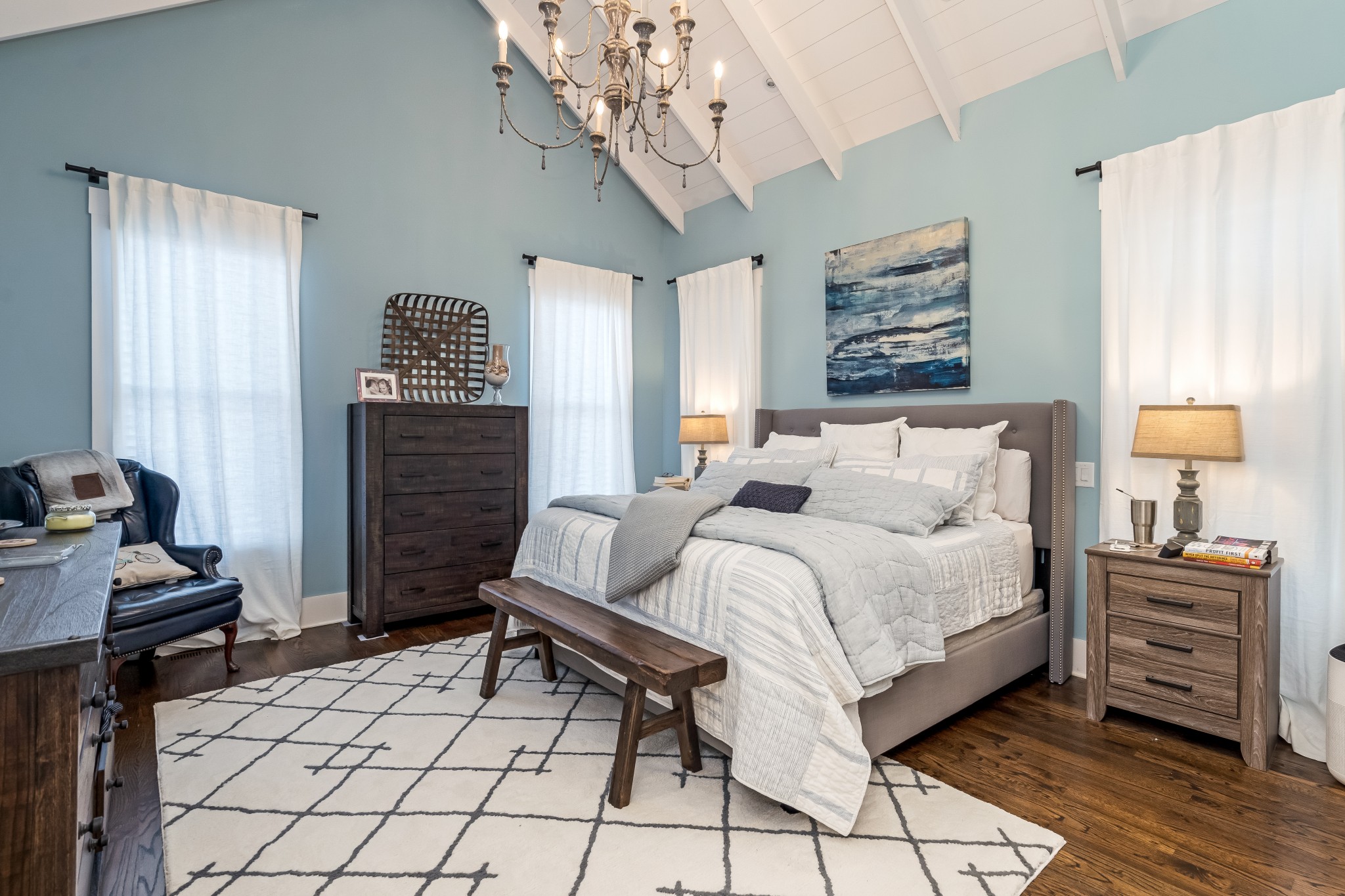 325 Circuit Road Franklin, TN 37064 - Photo 20 of 55 a bedroom with a bed and a chandelier