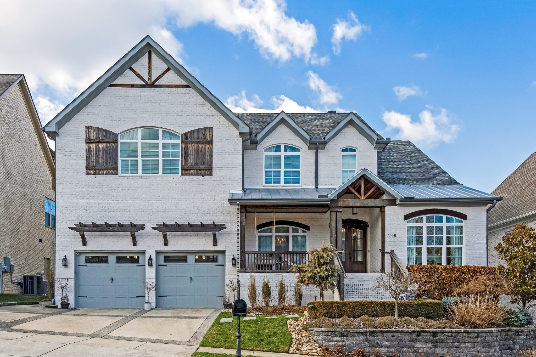 325 Circuit Road Franklin, TN 37064 - Photo 2 of 55 a front view of a house with yard and parking