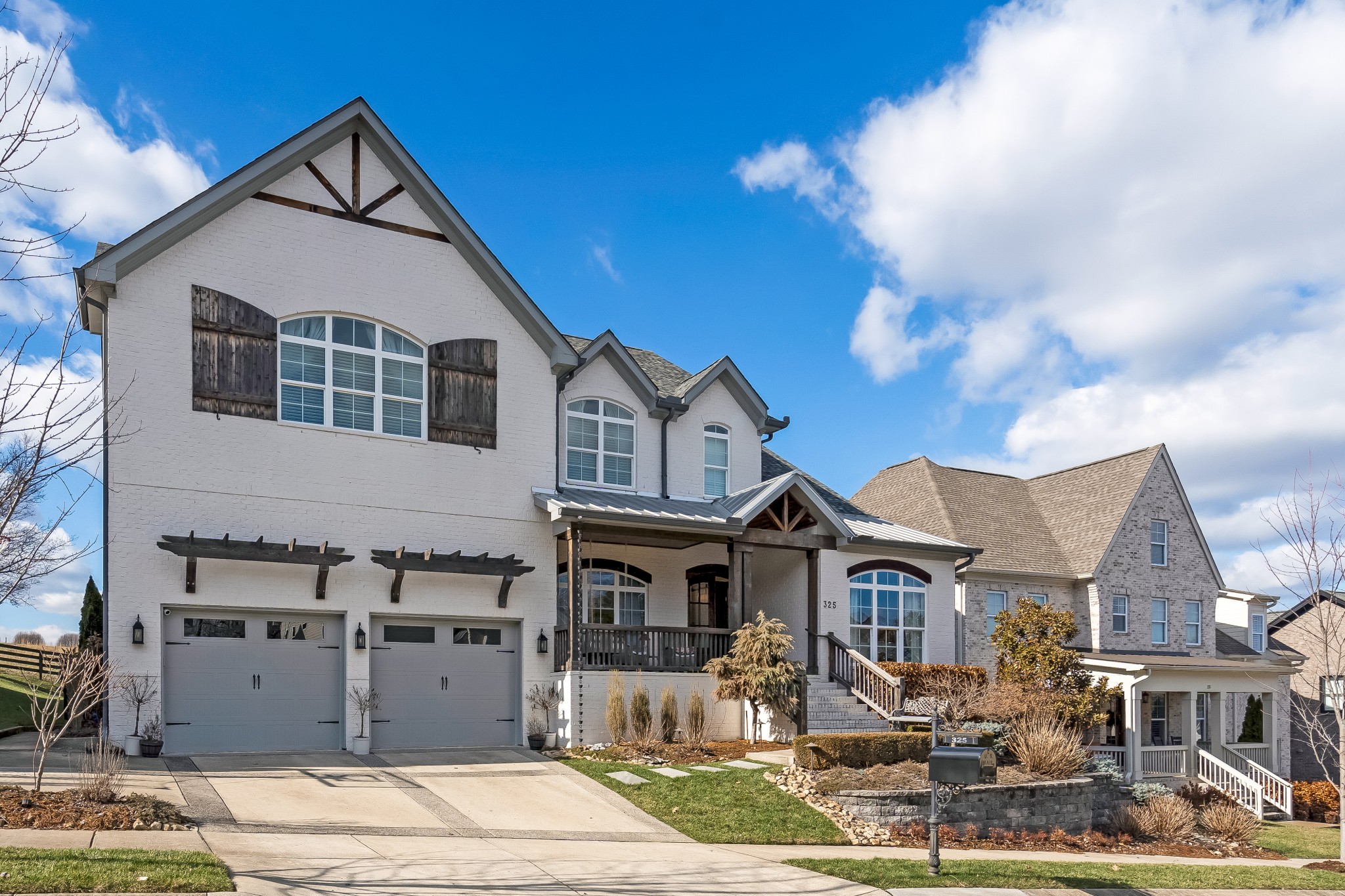 325 Circuit Road Franklin, TN 37064 - Photo 3 of 55 a front view of a house with a yard