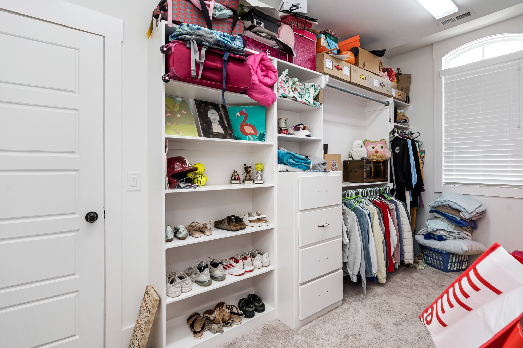 325 Circuit Road Franklin, TN 37064 - Photo 38 of 55 a view of walk in closet with clothes and shoes
