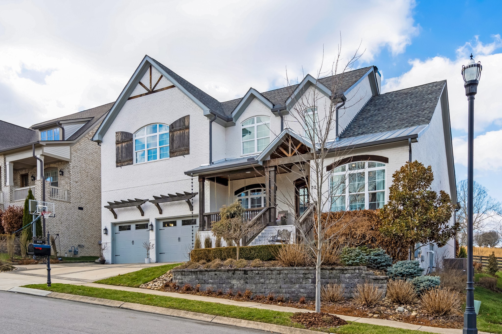 325 Circuit Road Franklin, TN 37064 - Photo 4 of 55 a front view of a house with garden