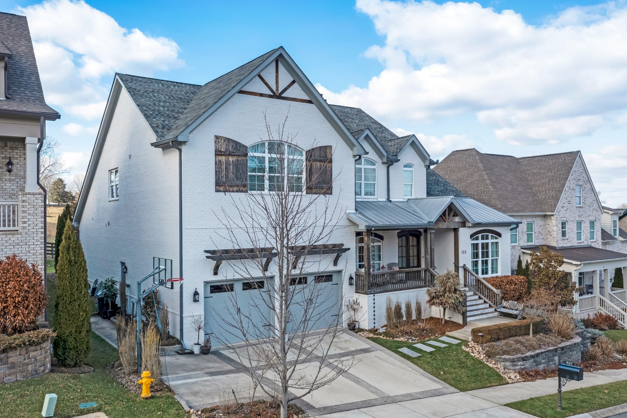 325 Circuit Road Franklin, TN 37064 - Photo 7 of 55 a front view of a house with garden