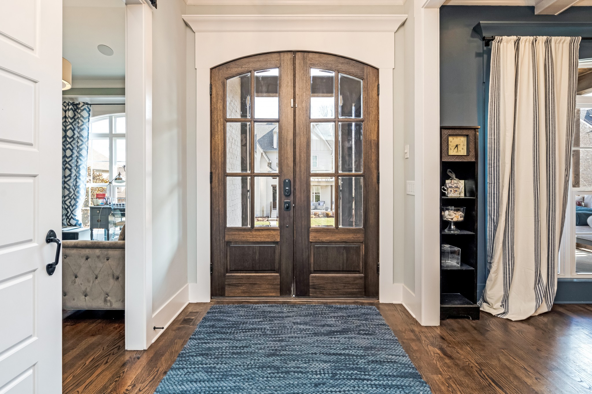 325 Circuit Road Franklin, TN 37064 - Photo 10 of 55 a view of front door with hallway and wooden floor