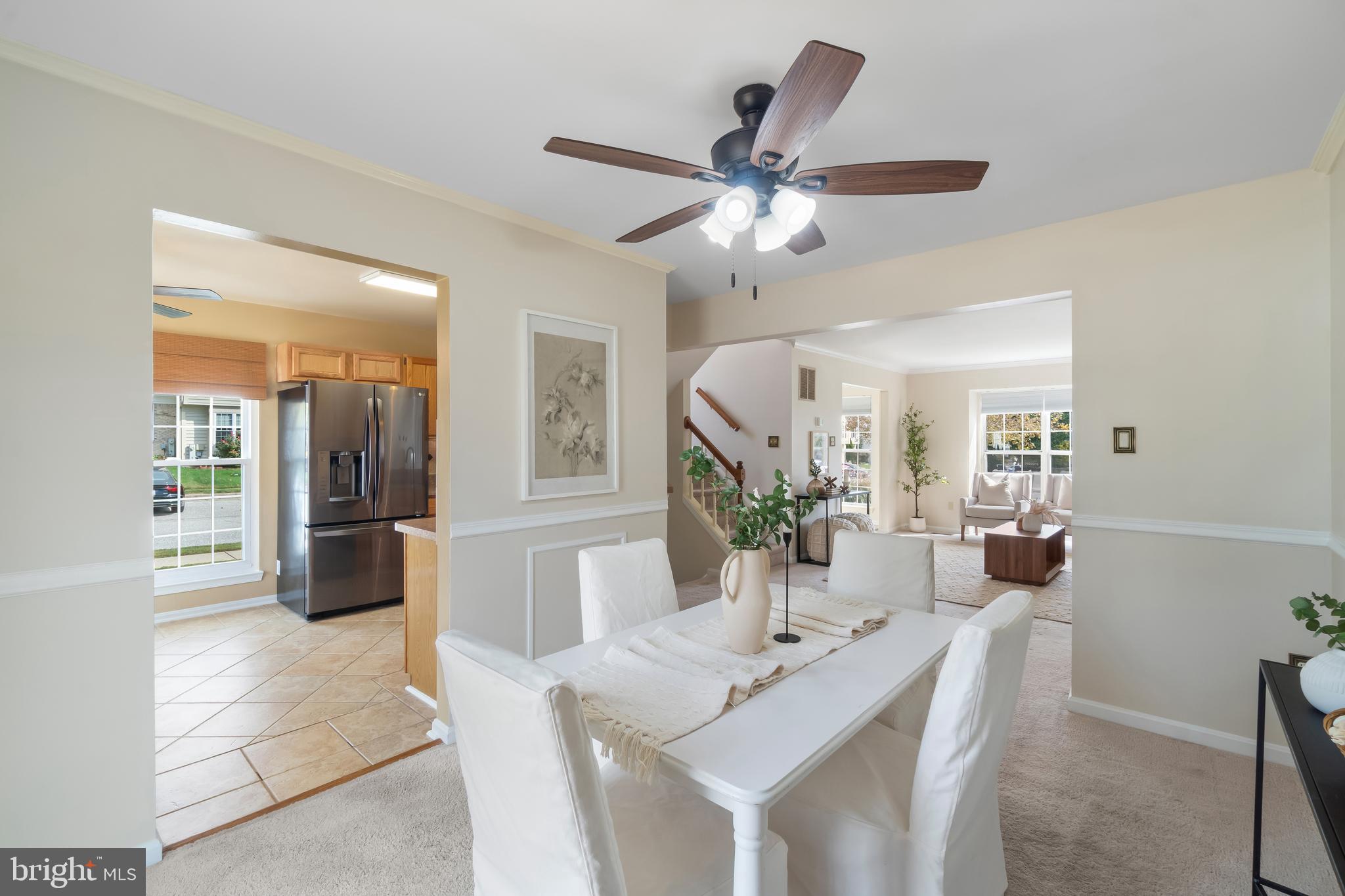 4402 Cole Farm Road Nottingham, MD 21236 - Photo 11 of 42 a view of a dining room with furniture and wooden floor
