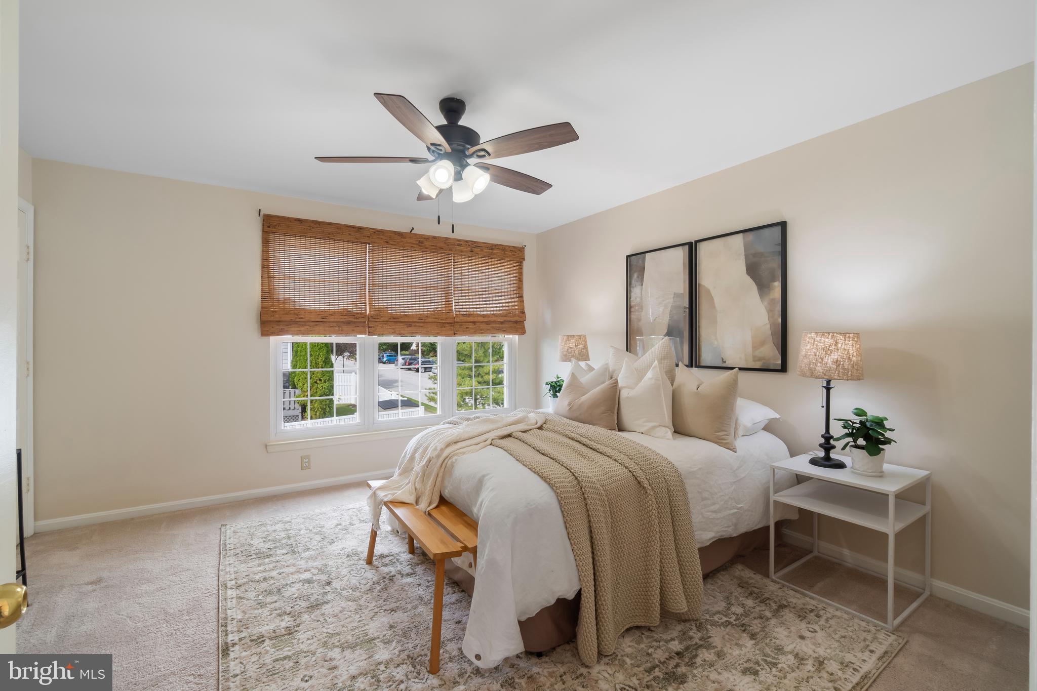 4402 Cole Farm Road Nottingham, MD 21236 - Photo 18 of 42 a bedroom with a large bed and a window