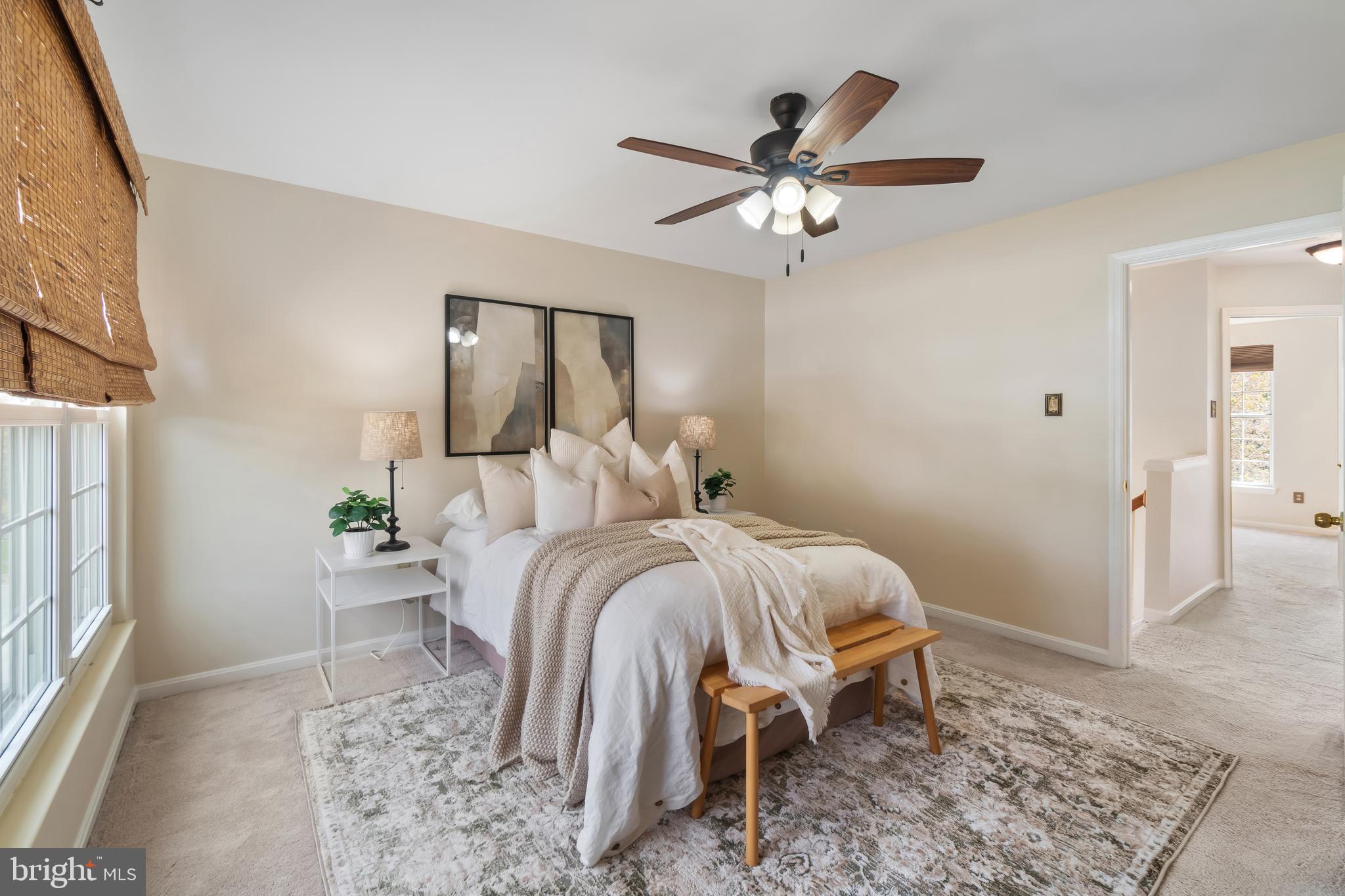 4402 Cole Farm Road Nottingham, MD 21236 - Photo 19 of 42 a bed room with a bed and a chandelier