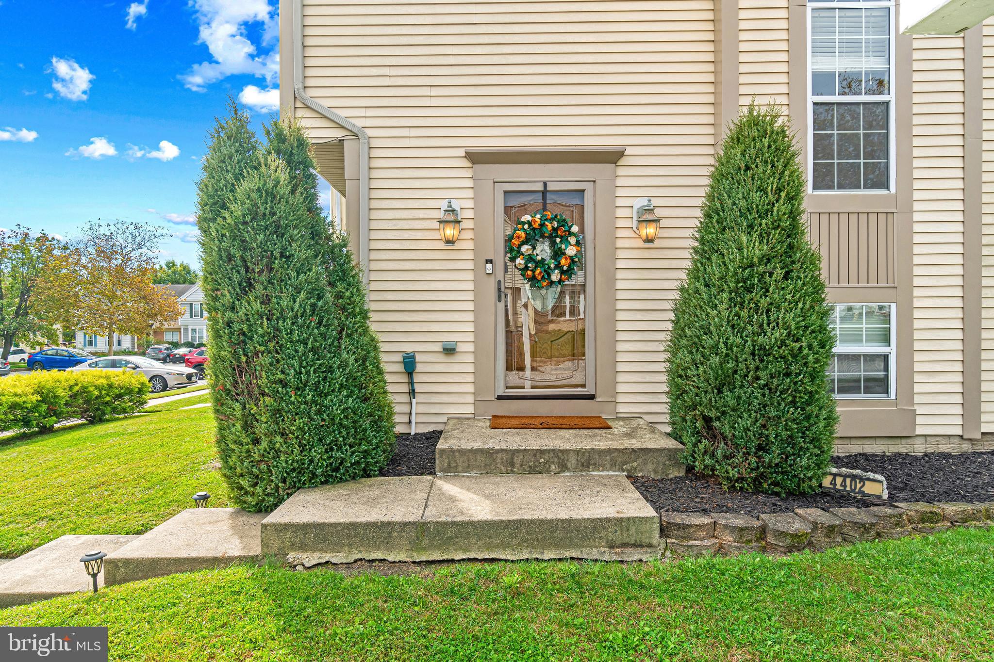 4402 Cole Farm Road Nottingham, MD 21236 - Photo 2 of 42 a front view of a house with garden