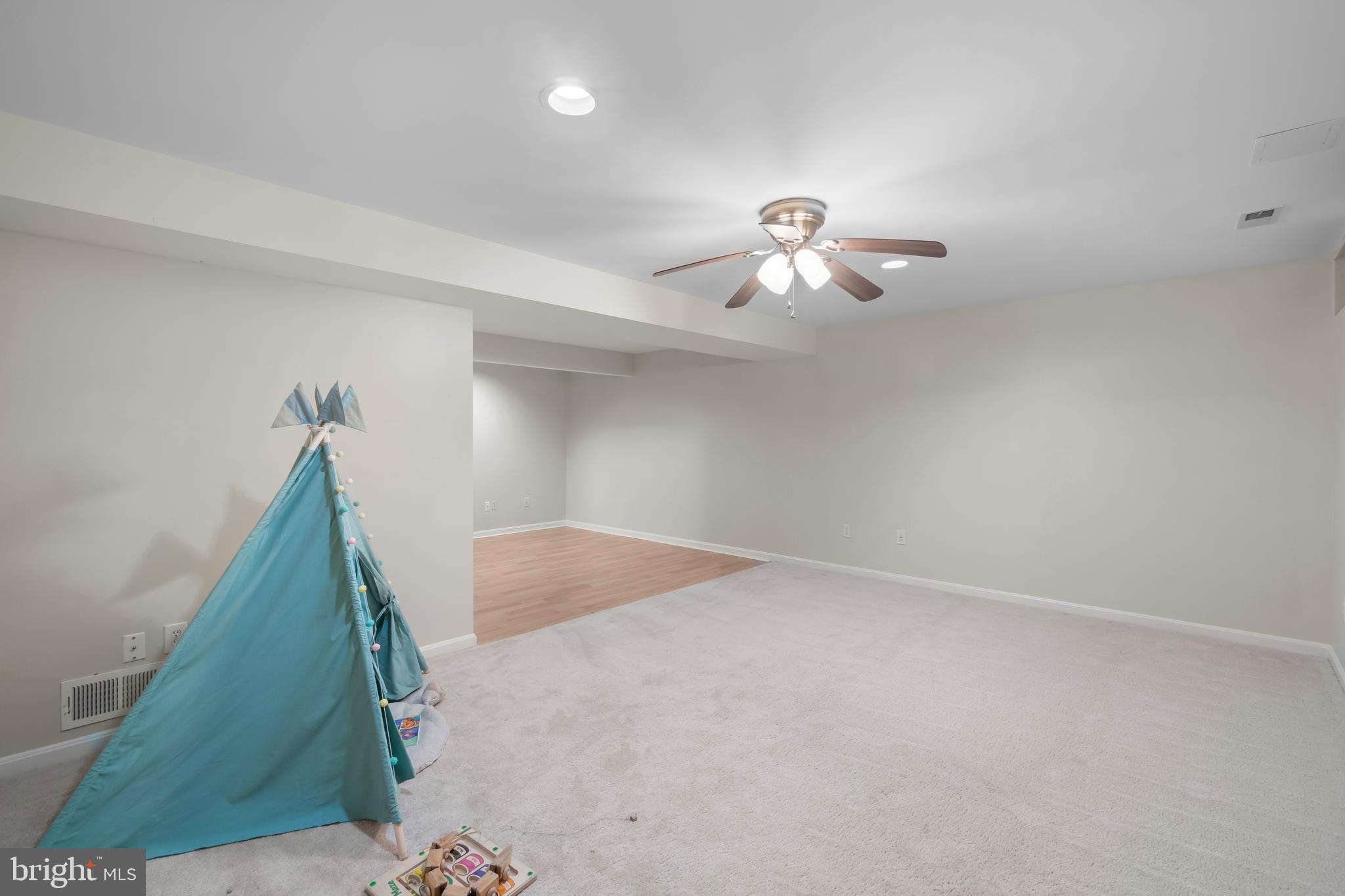 4402 Cole Farm Road Nottingham, MD 21236 - Photo 33 of 42 a view of a chandelier fan in big room