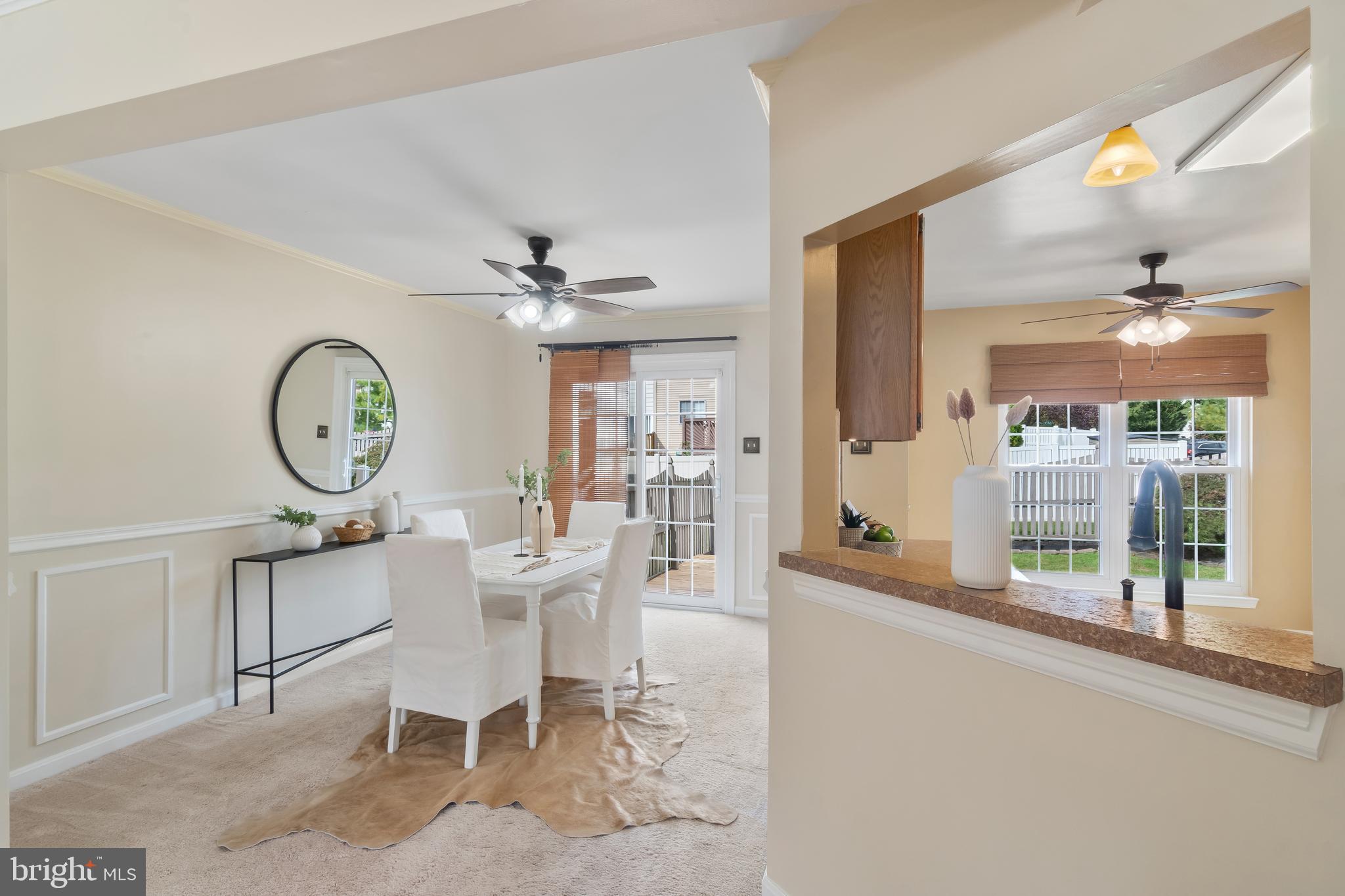 4402 Cole Farm Road Nottingham, MD 21236 - Photo 8 of 42 a living room with furniture a clock and a clock