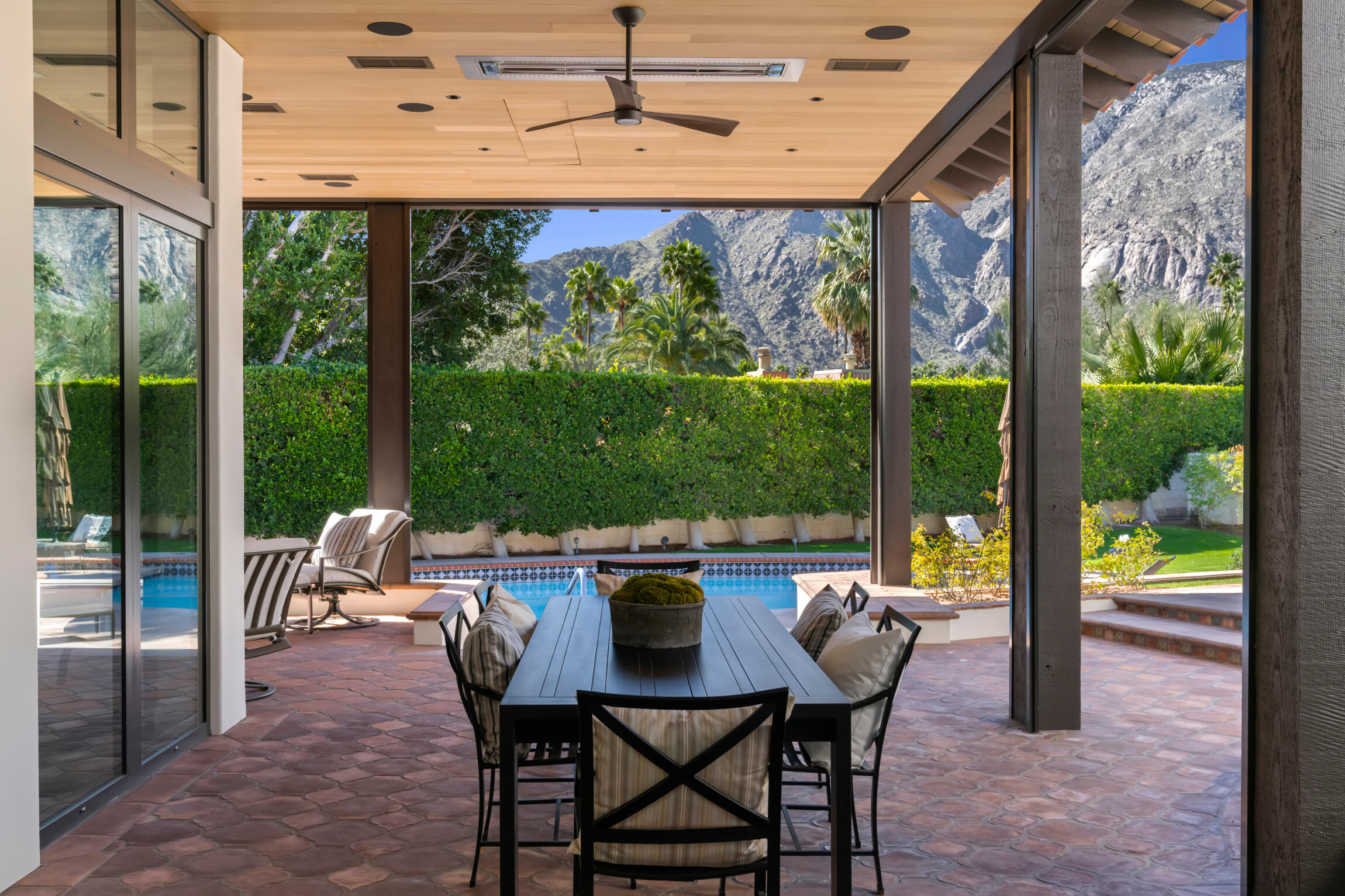555 West Stevens Road Palm Springs, CA 92262 - Photo 45 of 95 a view of a patio with a table chairs and a table