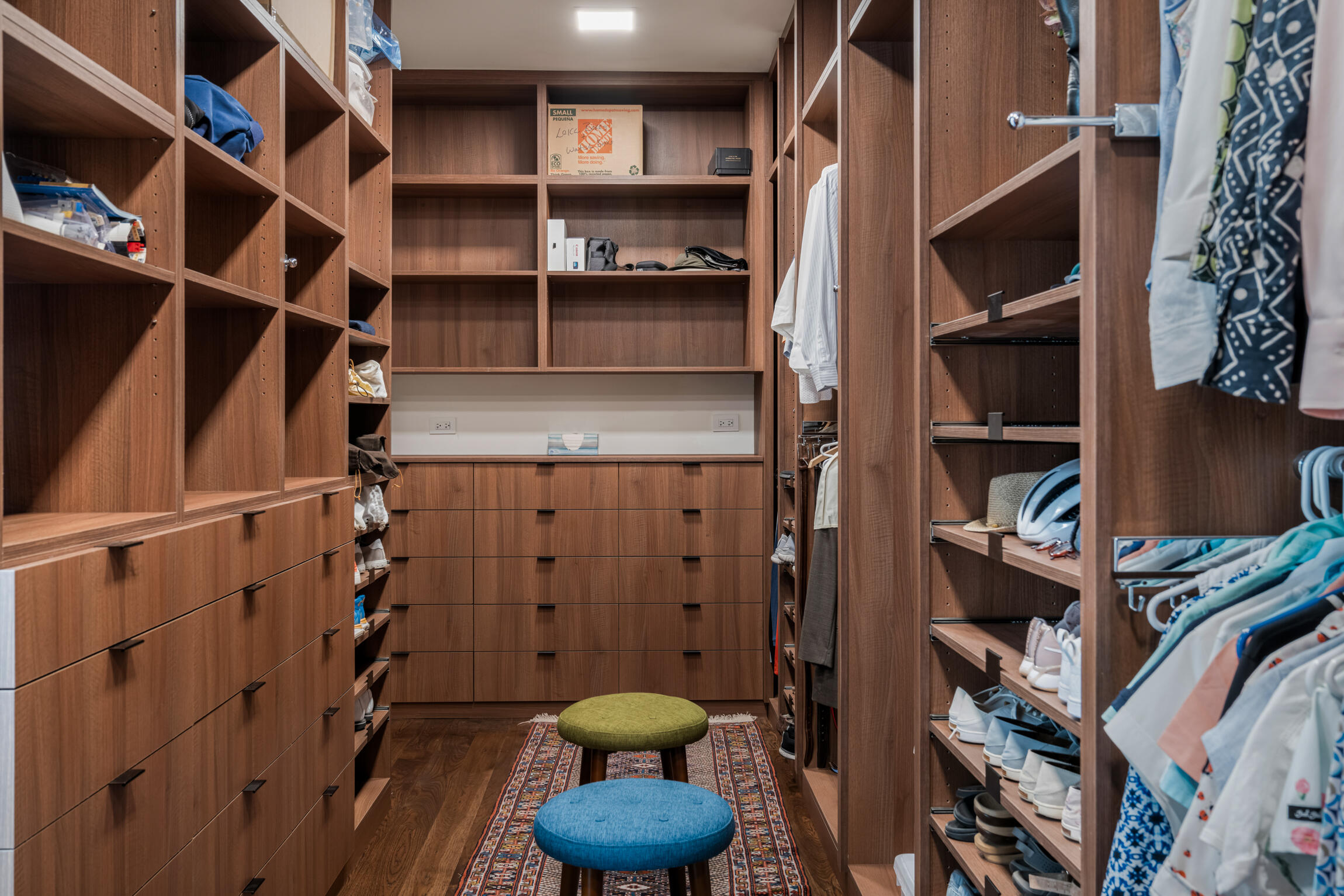 555 West Stevens Road Palm Springs, CA 92262 - Photo 51 of 95 a view of walk in closet with clothes and shoes