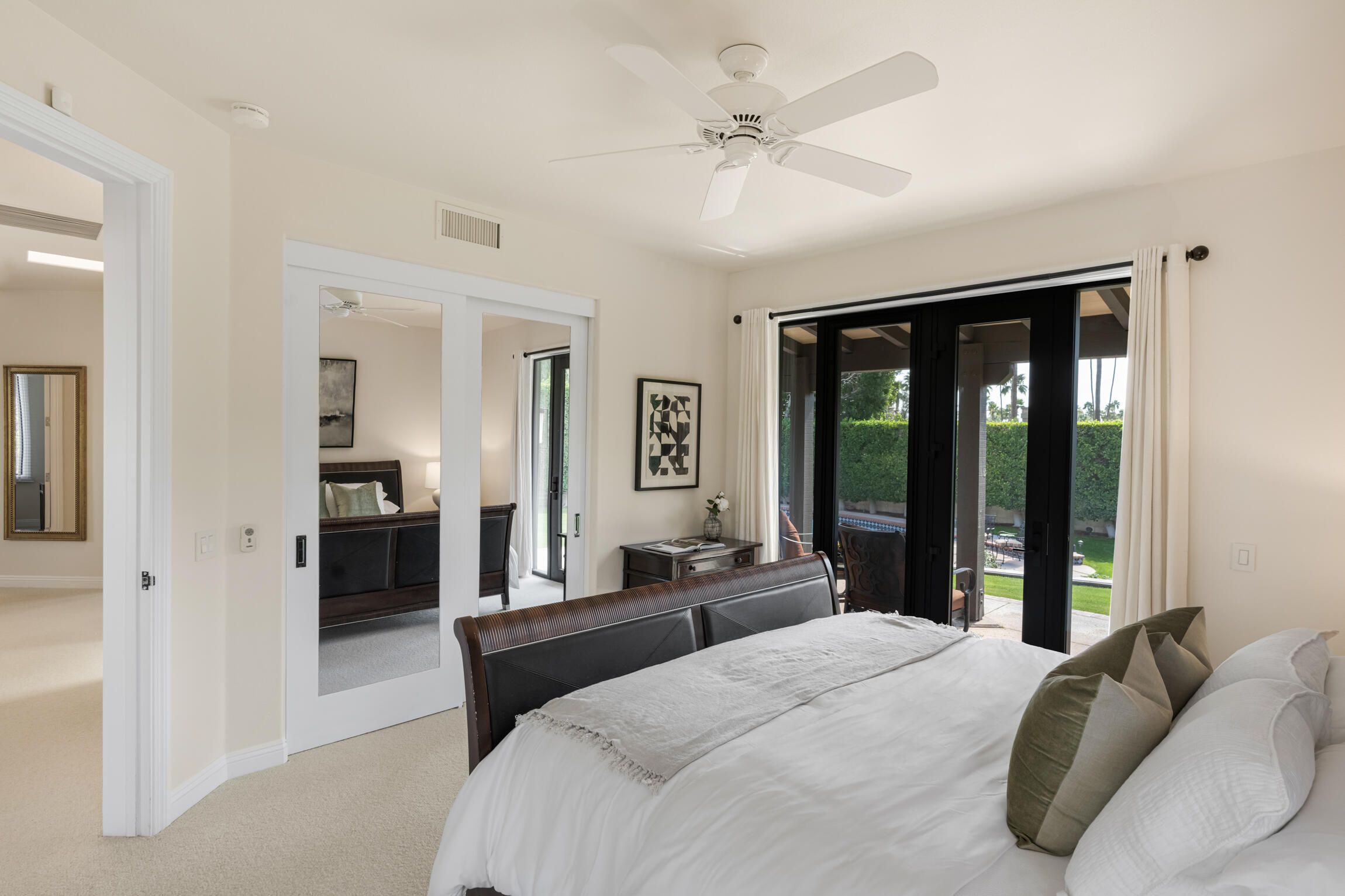 555 West Stevens Road Palm Springs, CA 92262 - Photo 73 of 95 a bedroom with a large bed and a large window
