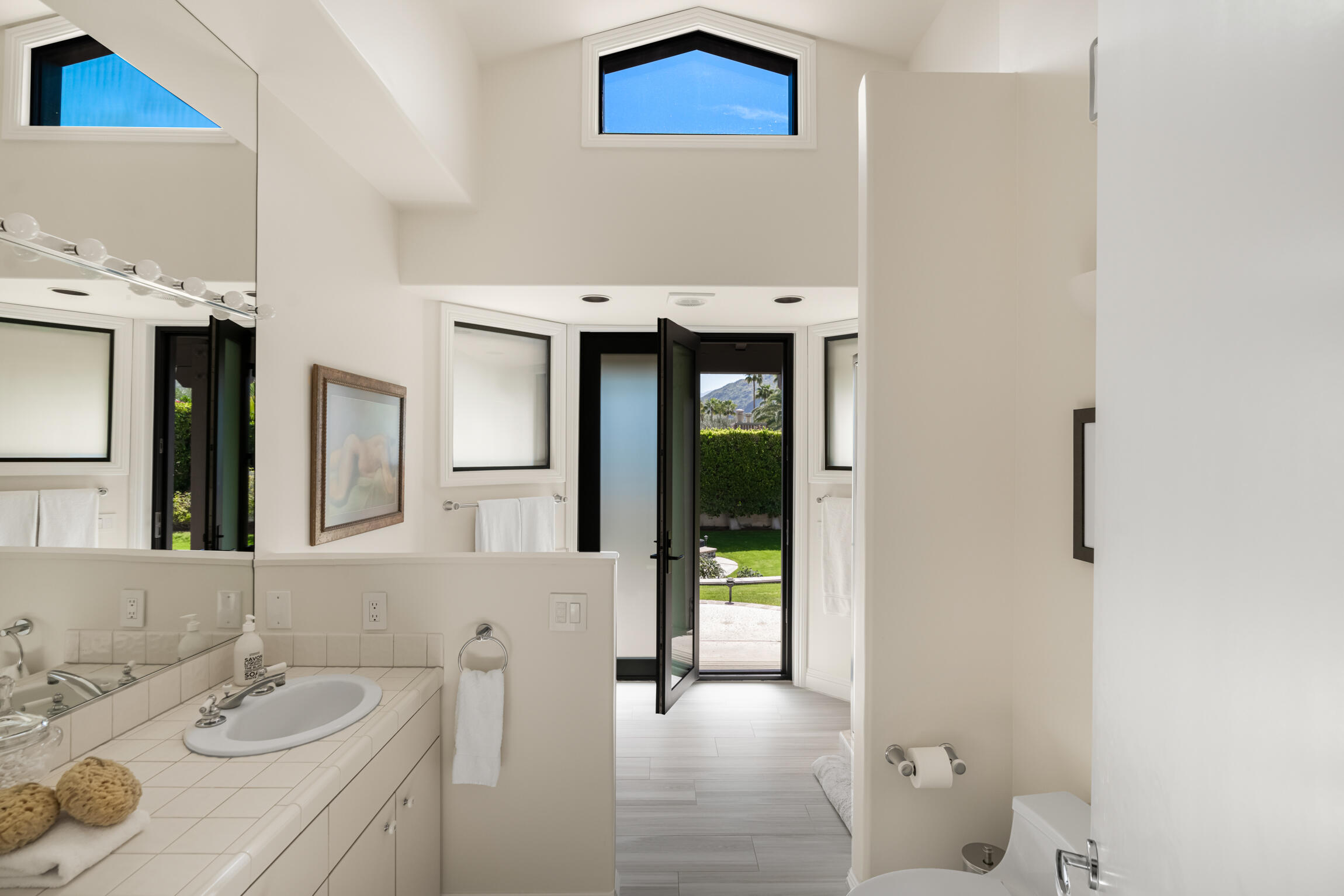 555 West Stevens Road Palm Springs, CA 92262 - Photo 78 of 95 a bathroom with a sink and a mirror