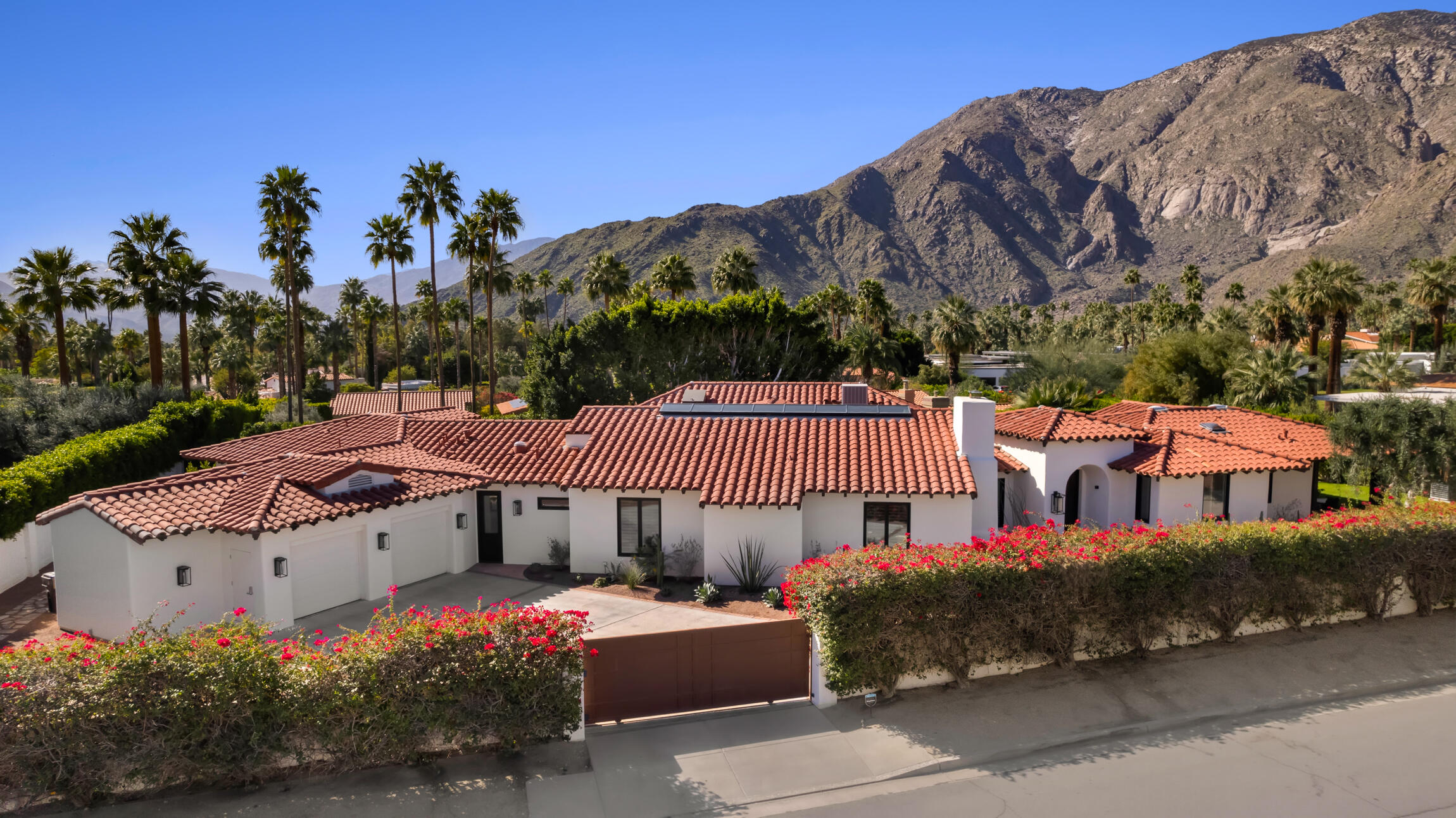 555 West Stevens Road Palm Springs, CA 92262 - Photo 95 of 95 a view of a house with a garden