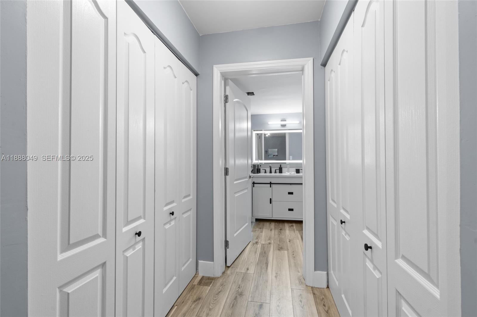 4624 Northwest 97th Place, Unit 252 Doral, FL 33178 - Photo 17 of 28 a view of wooden floor and closet