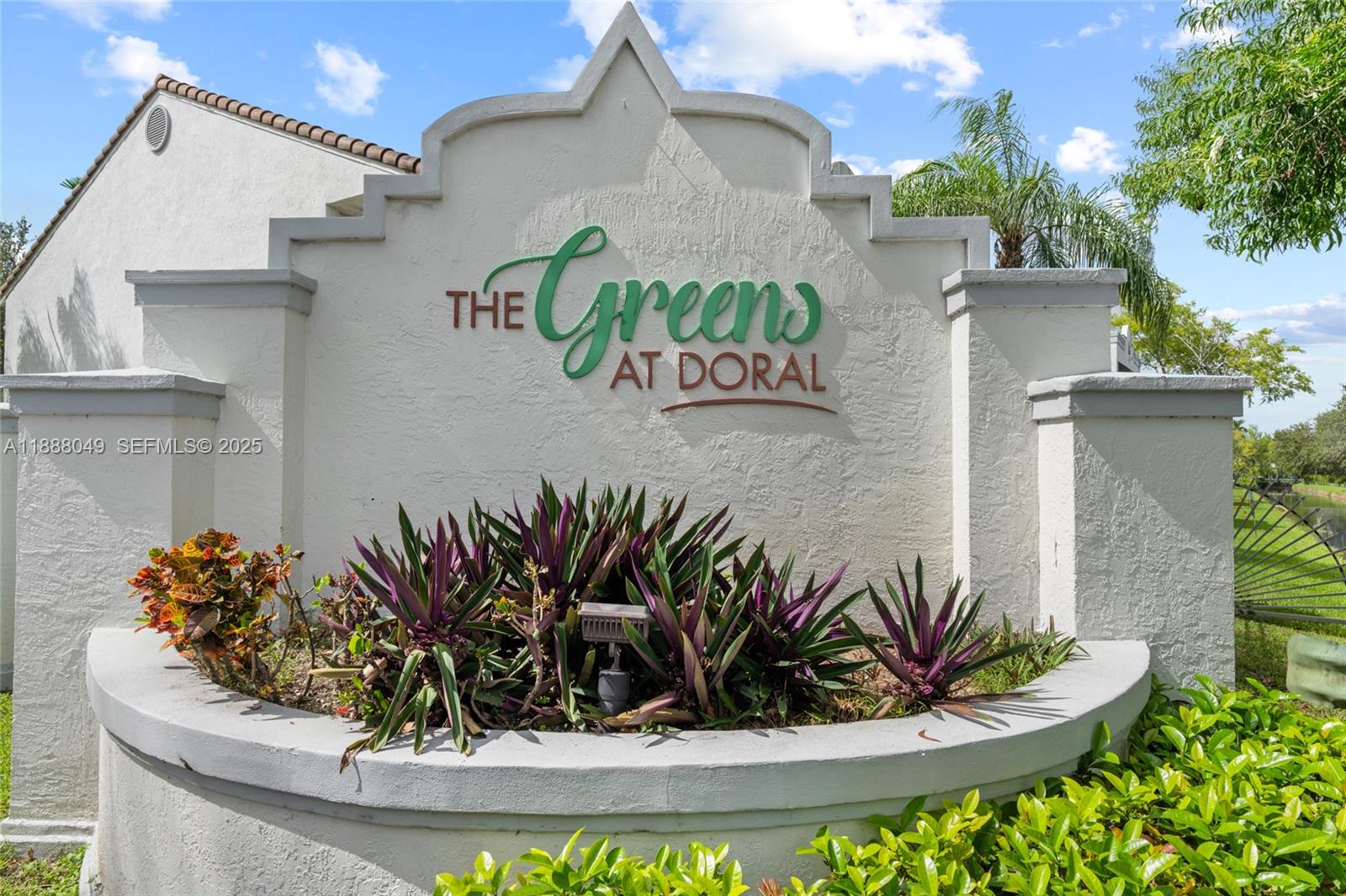 4624 Northwest 97th Place, Unit 252 Doral, FL 33178 - Photo 20 of 28 a view of a potted plants in front of a house