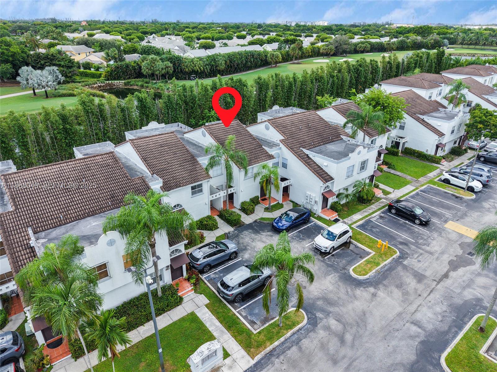 4624 Northwest 97th Place, Unit 252 Doral, FL 33178 - Photo 21 of 28 an aerial view of a house with garden space and lake view